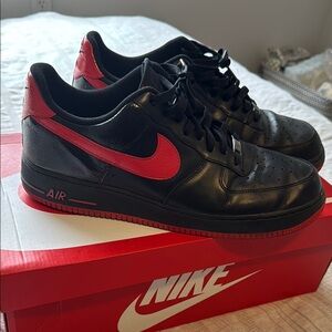 Nike Black and Red Sneakers with Classic Design